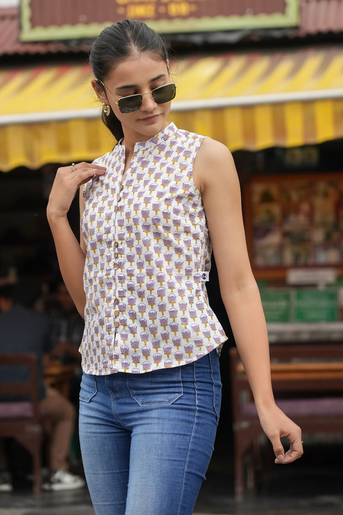 Close-up of lotus print on Pihu violet top