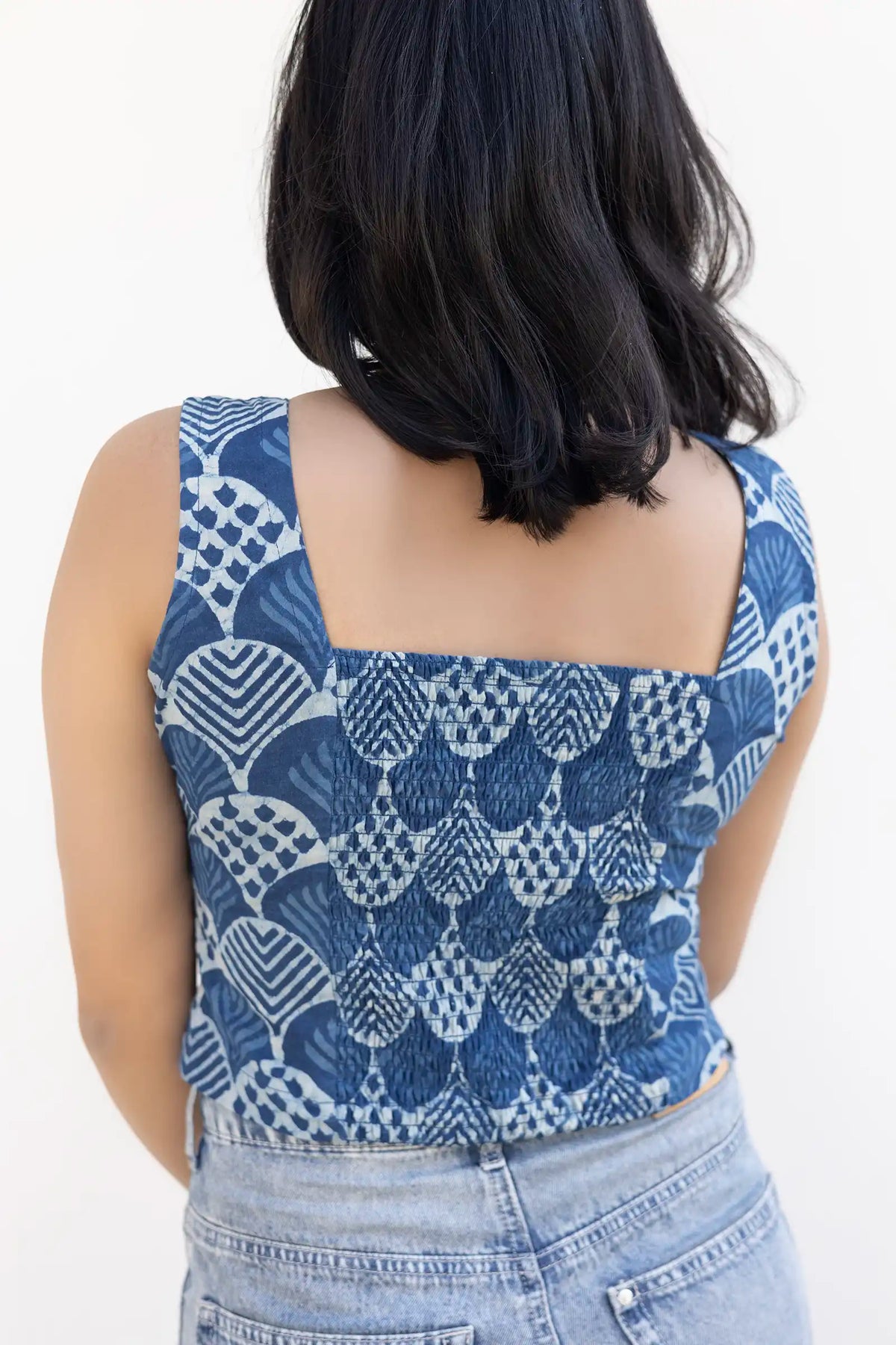 Indigo blue crop top with fitted silhouette