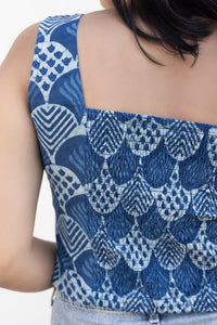 Chic indigo crop top styled with high-waist jeans