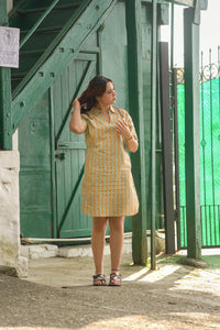 Mahira artisan made dress in green organic cotton